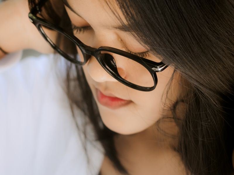 A person wearing comfortable everyday eyeglasses